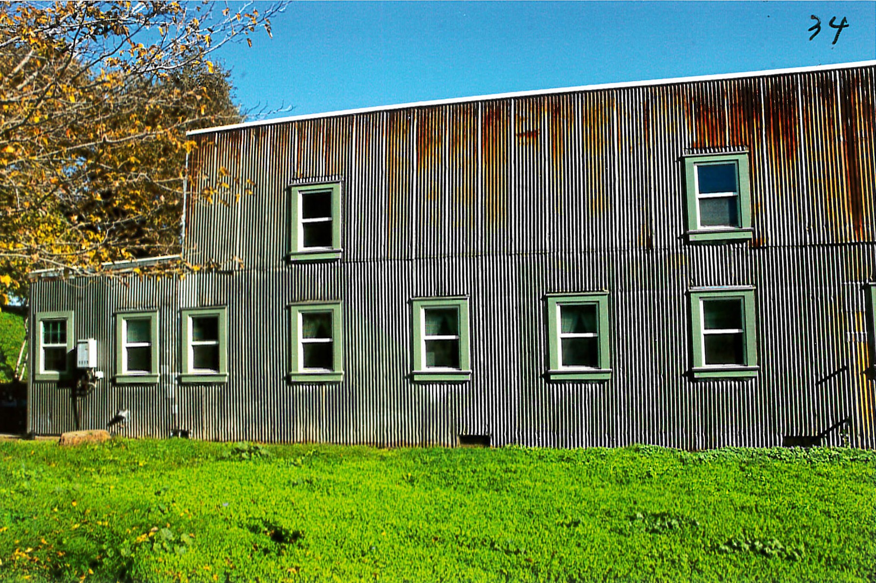 Renovated exterior, matching siding with weathered effect